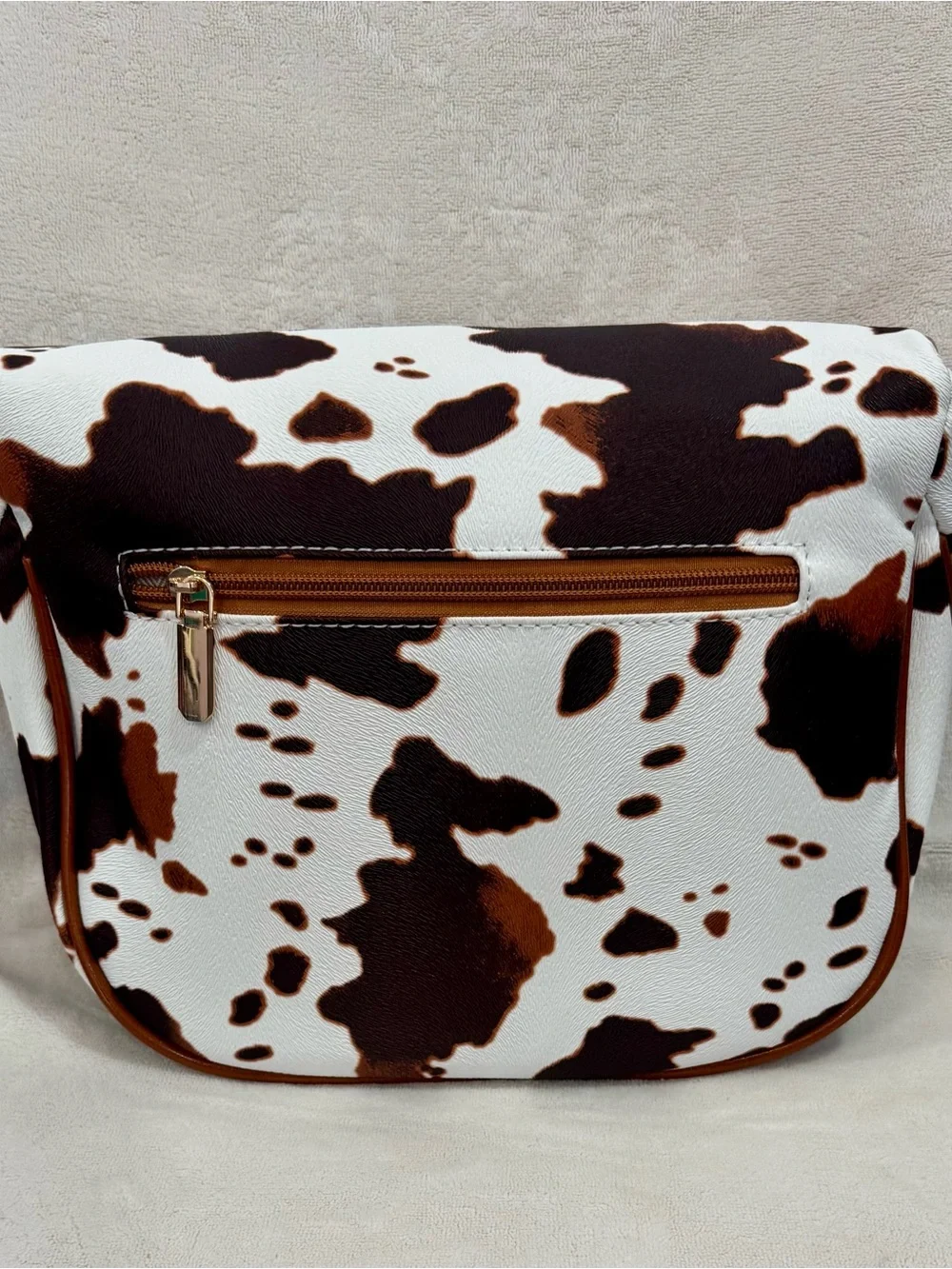 New Cowhide-Print Brown and White Crossbody Bag with Gold Hardware